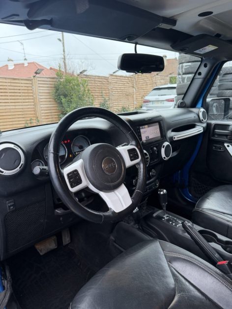 JEEP WRANGLER UNLIMITED 2014 - 75 881Kms - Premier Main - Parfait Etat - SUIVIT JEEP