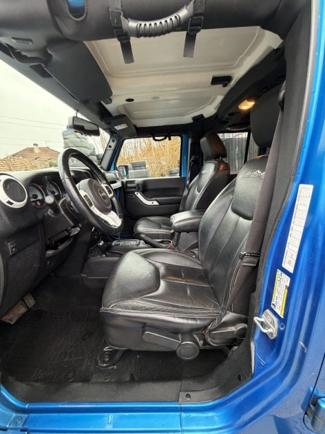 JEEP WRANGLER UNLIMITED 2014 - 75 881Kms - Premier Main - Parfait Etat - SUIVIT JEEP