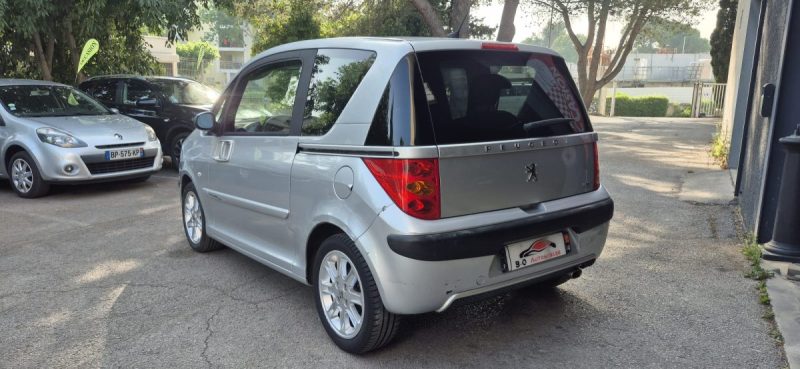 Peugeot 1007 1.4l TU 75ch gris BVA 5, *Climatisation*, *Peu kilométrés*