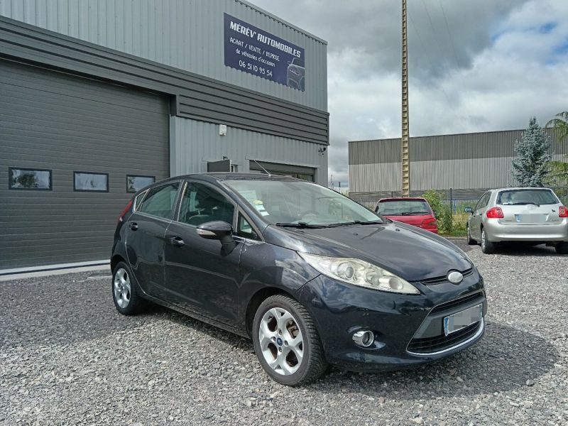 FORD FIESTA 2010 Titanium 1.4 TDCI 68 cv / Clim / Bluetooth / Distribution neuve